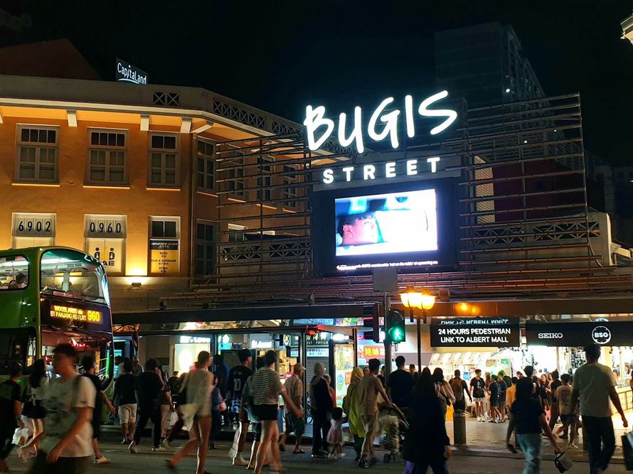 the-outside-of-Bugis-Street-Zone-with-its-sign-during-the-night.jpg